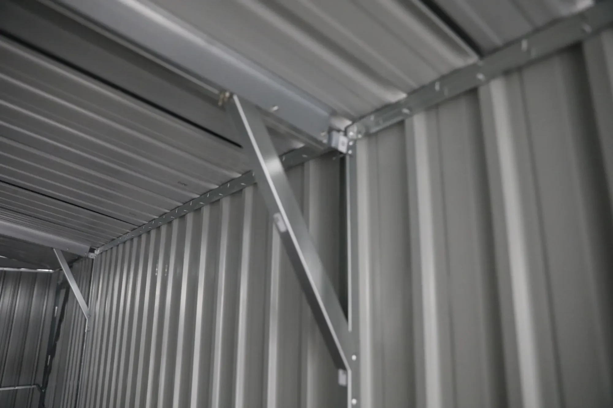 10x20-ft-single-car-metal-garage-scene-2