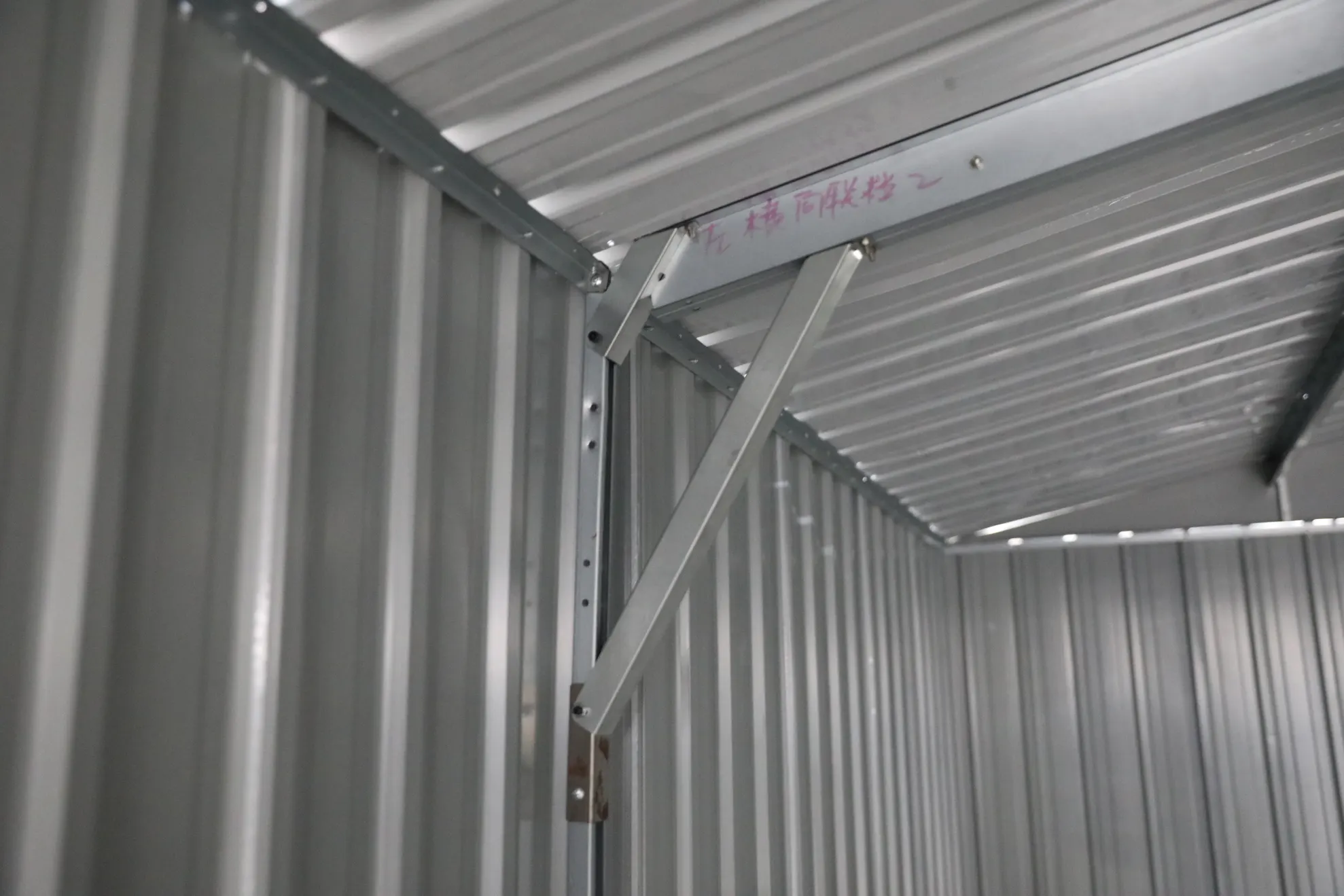 10x20-ft-single-car-metal-garage-scene-4