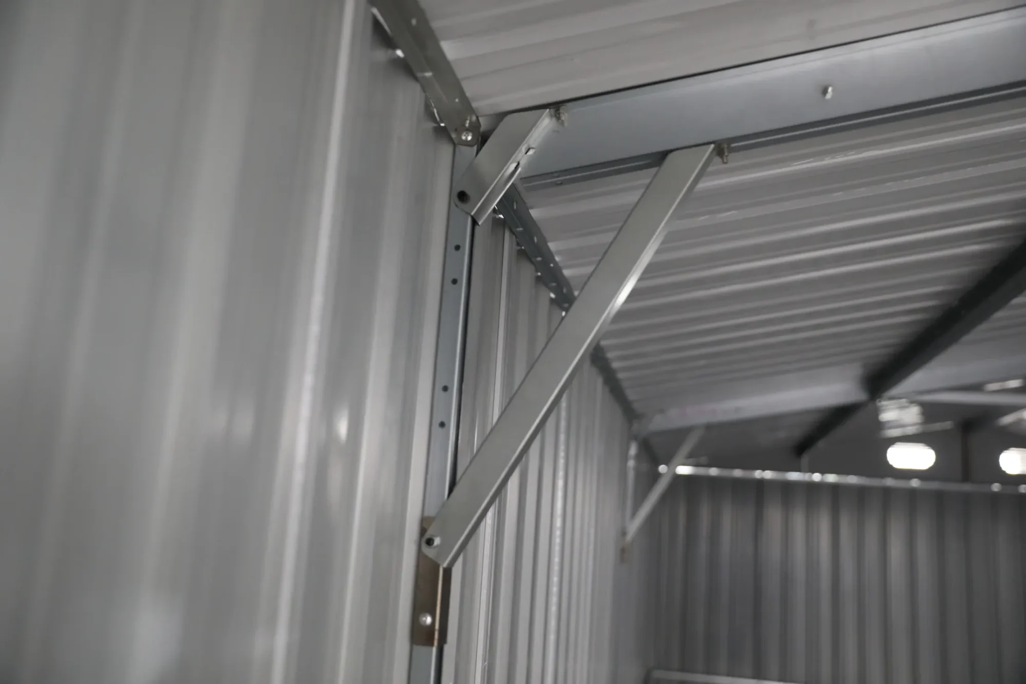 10x20-ft-single-car-metal-garage-scene-9